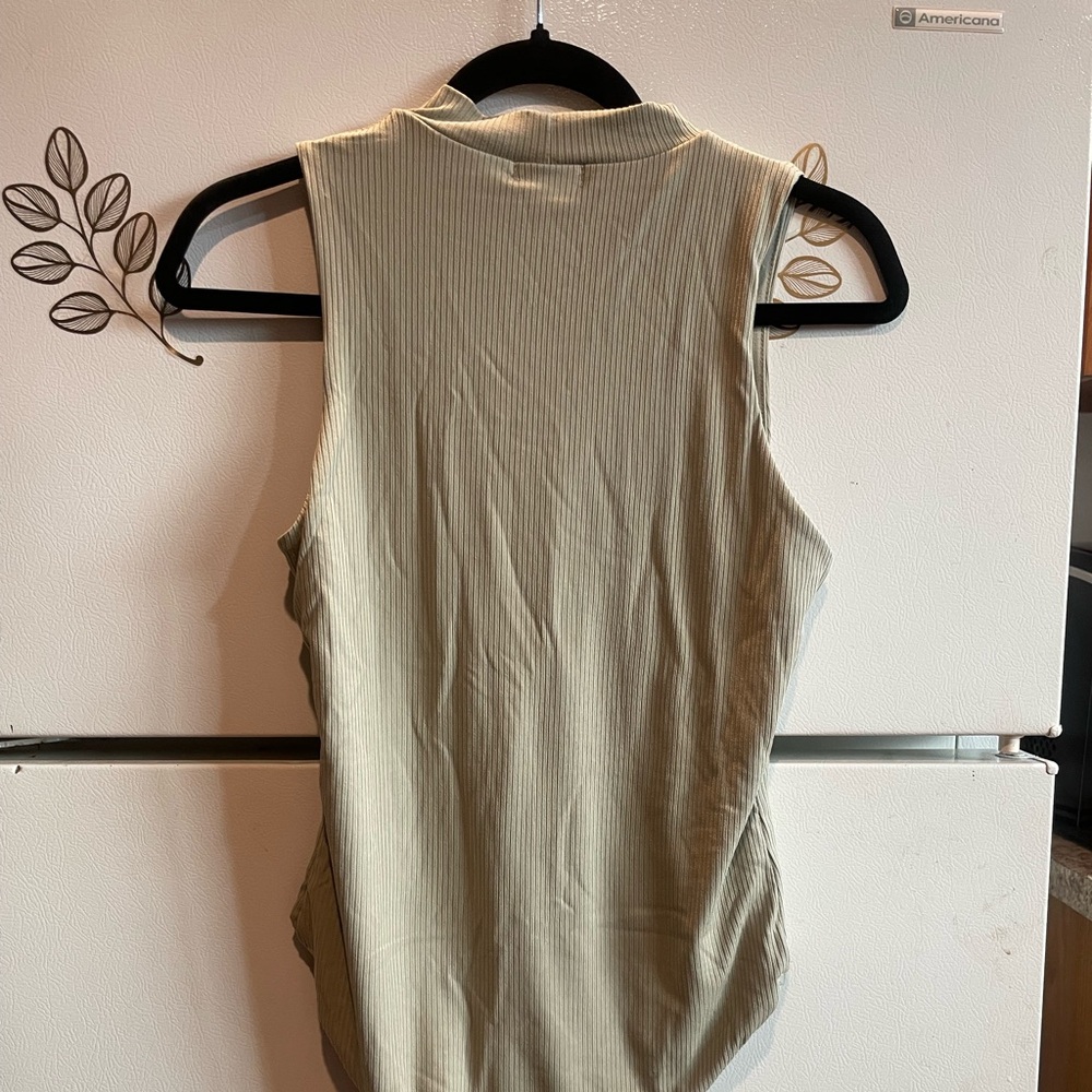 Papaya sage bodysuit with snap enclosure